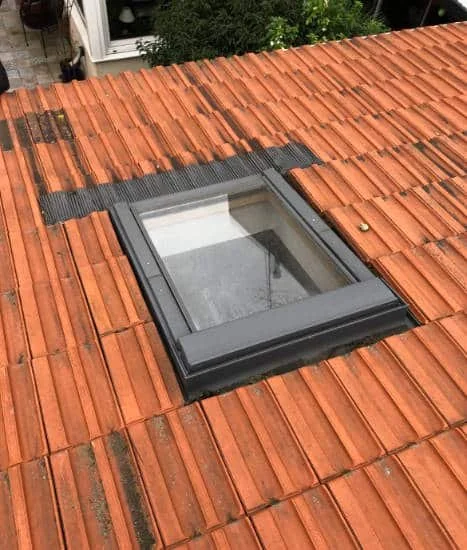 Velux posé sur couverture en tuiles